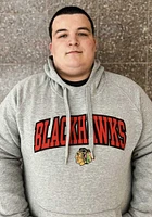 Antigua Chicago Blackhawks Mens Victory Wordmark Long Sleeve Hoodie