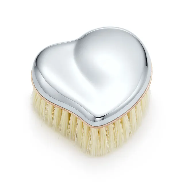 https://cdn.mall.adeptmind.ai/https%3A%2F%2Fmedia.tiffany.com%2Fis%2Fimage%2FTiffany%2FEcomItemL2%2Felsa-perettiheart-baby-brush-24092321_878447_ED.jpg%3F%26op_usm%3D2.0%2C1.0%2C6.0%26%24cropN%3D0.1%2C0.1%2C0.8%2C0.8%26defaultImage%3DNoImageAvailableInternal%26_640x.webp