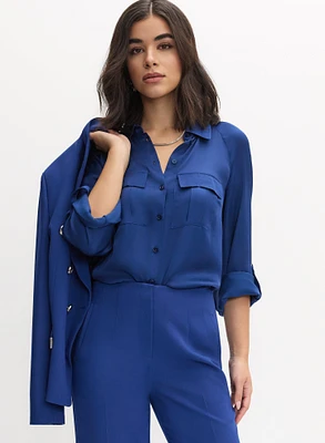 Blouse en satin à poches utilitaires