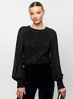 Haut à paillettes et manches bouffantes