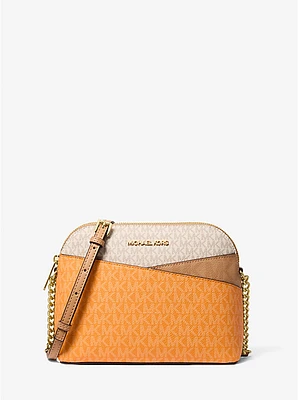 Bolso cruzado Jet Set Travel mediano con bloques de color y logotipo la marca