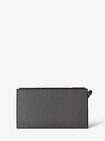 Jet Set Large Studded Pebbled Leather Wristlet