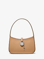 Bolso pochette Lyra pequeño de piel