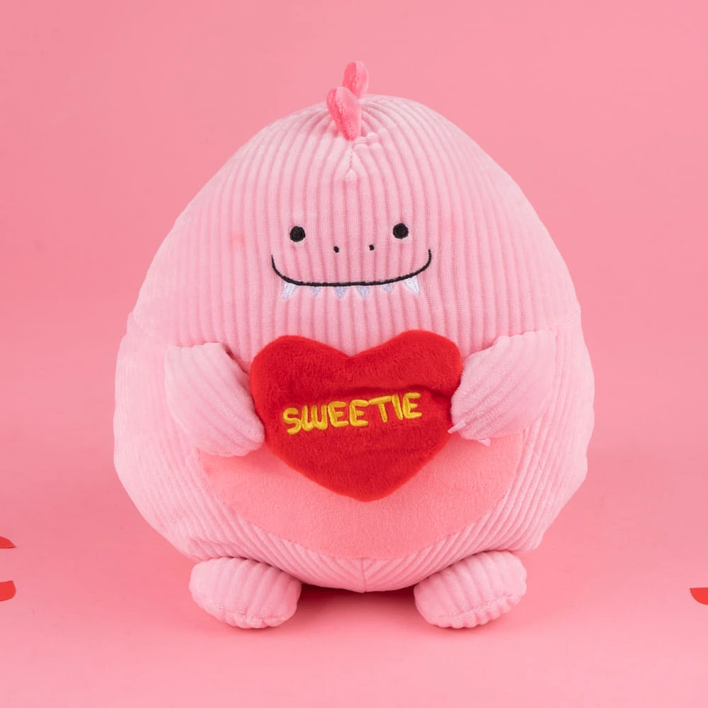 Peluche Miniso  Dinosaurio Minisow Con Corazón Felpa Rosa 20x24 cm