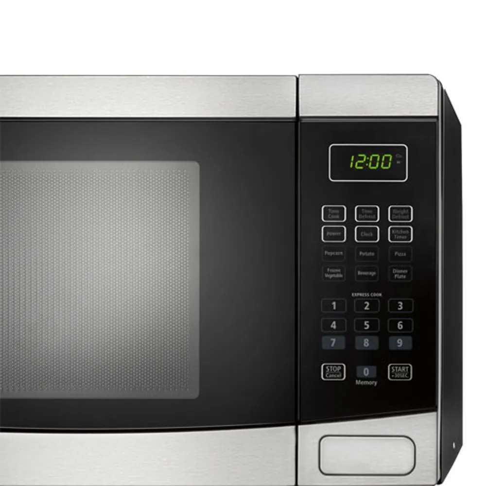 Insignia Countertop Microwave - 1.2 Cu. Ft. - Stainless Steel/Black Never  Used just NO BOX 