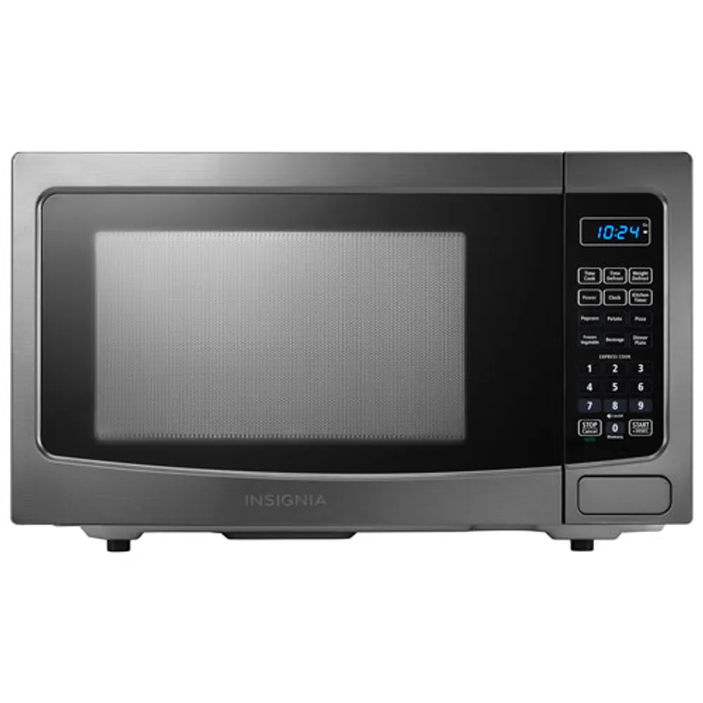 Insignia Countertop Microwave - 1.2 Cu. Ft. - Stainless Steel/Black Never  Used just NO BOX 