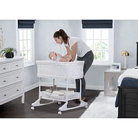 Delta Children SleepCool Rocking Bassinet - White