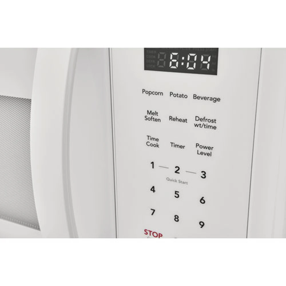 Four à micro-ondes à hotte intégrée de Frigidaire - 1,8 pi³ - Blanc