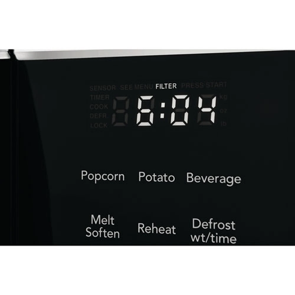 Four à micro-ondes à hotte intégrée de Frigidaire - 1,8 pi³ - Blanc
