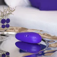 Stimulateur compact Pleasure Air Starlet 3 de Womanizer - Indigo