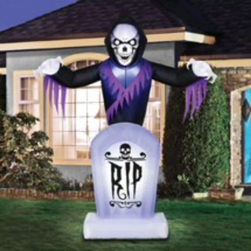 Occasions 8 Ft. Inflatable Reaper Behind Tombstone