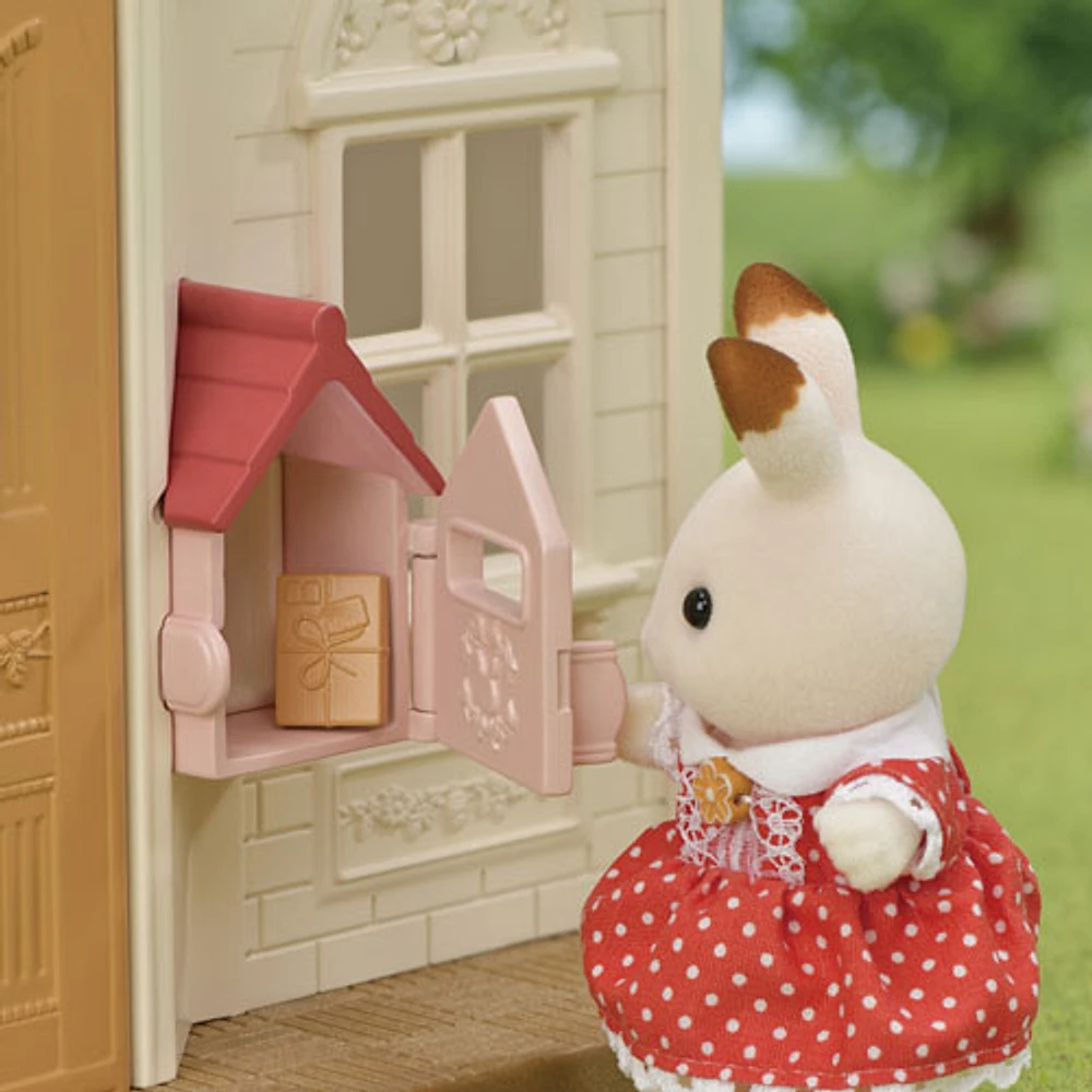 Ensemble de jeu Premier chalet douillet au toit rouge de Calico Critters