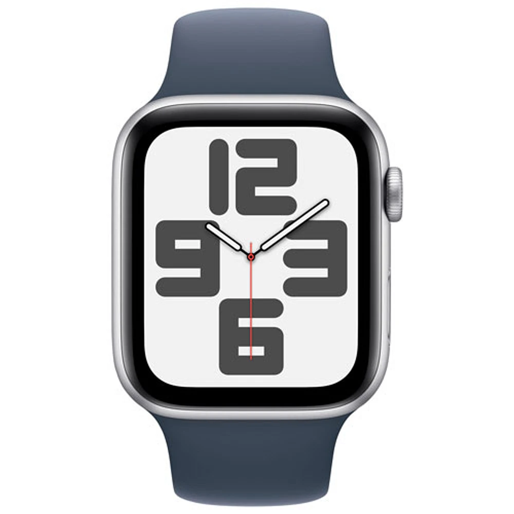 Apple Watch SE (GPS + Cellulaire) avec boîtier de 44 mm en aluminium argenté et bracelet sport bleu tempête par Koodo - Petit/Moyen - Paiement Balance mensuel