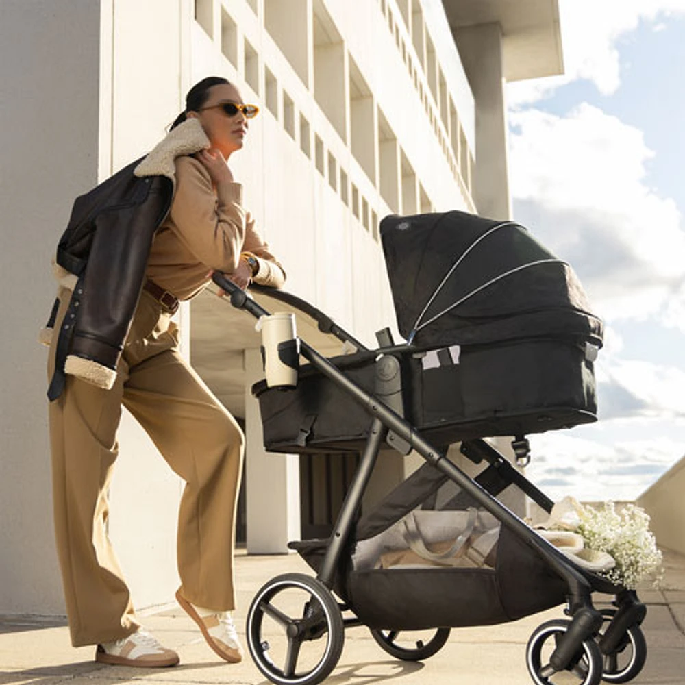 Evenflo Shyft Intuiti+ Travel System with Revolve180 LiteMax NXT SensorySoothe Infant Car Seat - Black