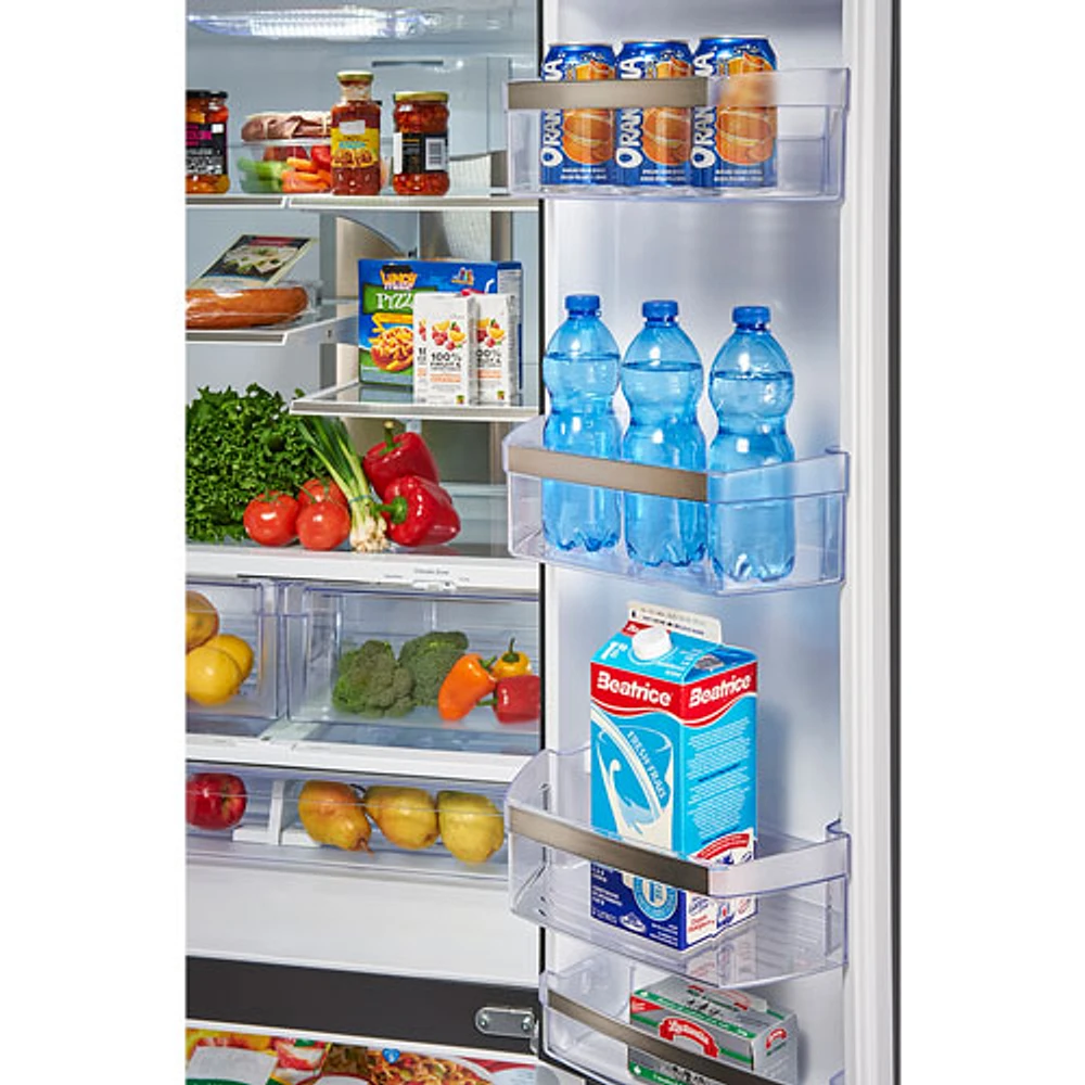 Réfrigérateur à deux portes 24,8 pi³ 33 po à distributeur d'eau et de glace Profile de GE (PFE24HYRCFS) - Acier inoxydable