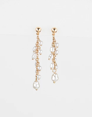 Aretes colgantes largos con perlas