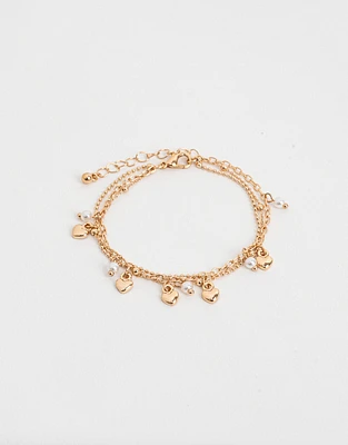 Pulsera con dije de corazones