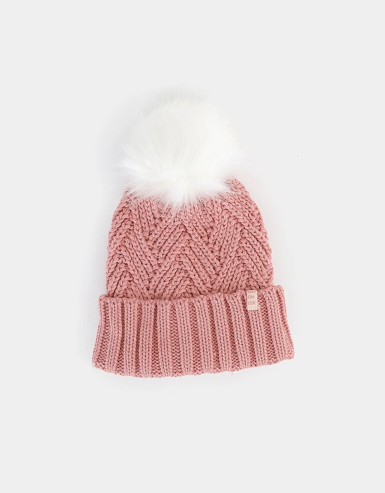 Gorro con trenzas y pompon