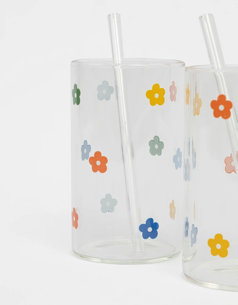 Set de vasos de vidrio con flores