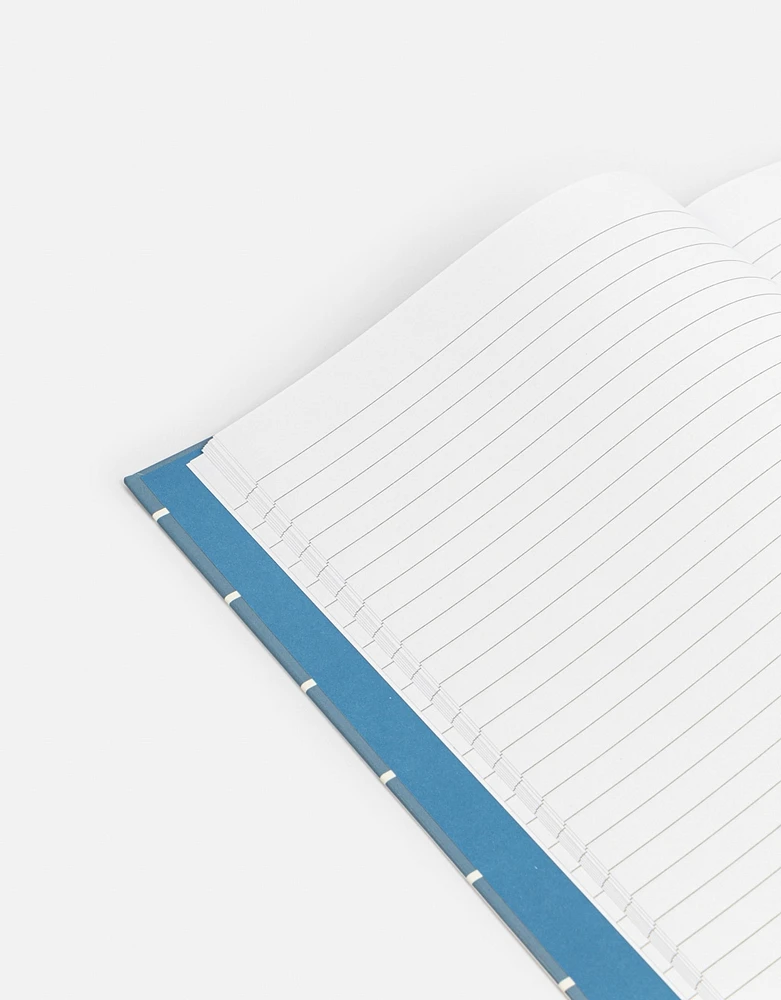 Cuaderno a4 fsc de 80 hojas rayadas con  tapa dura impresa
