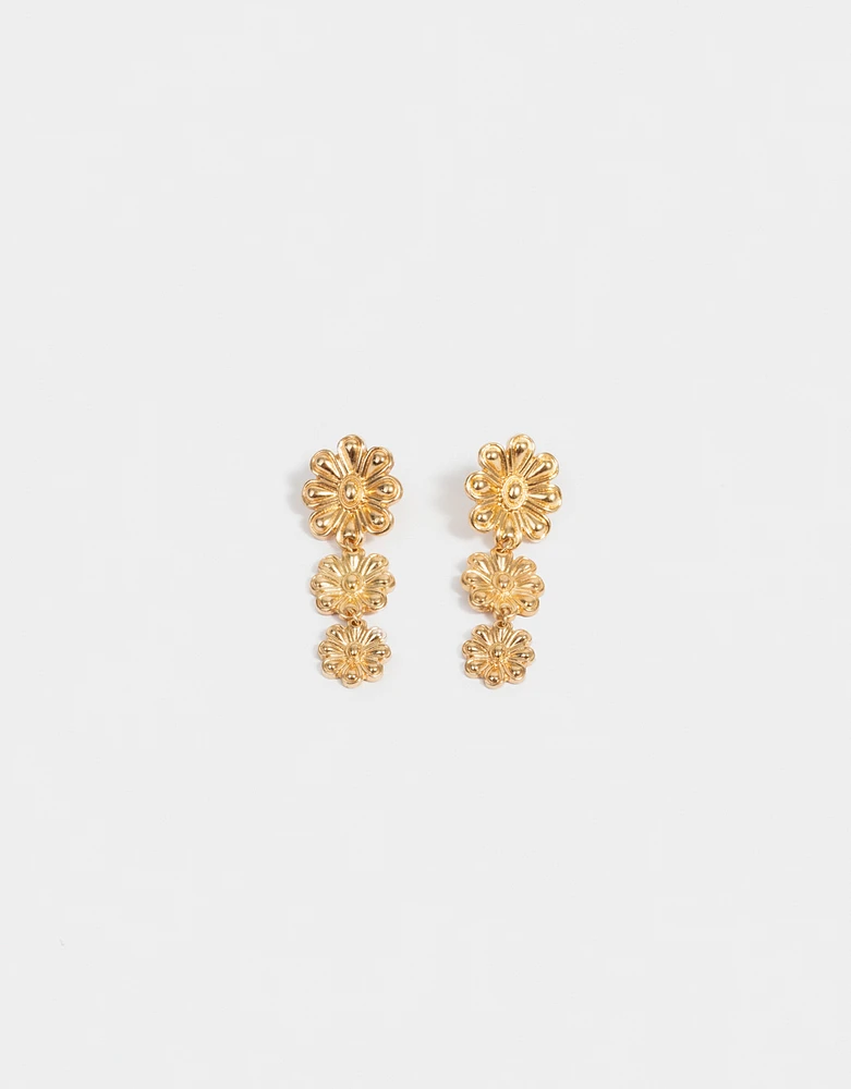 Aretes colgantes con flores