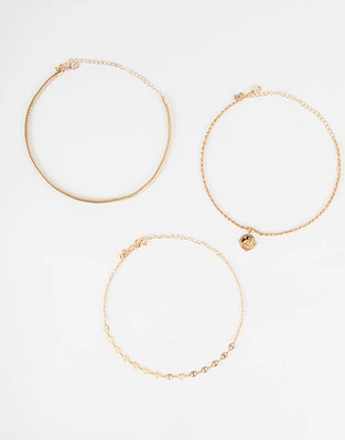 Set de chokers bañados en oro