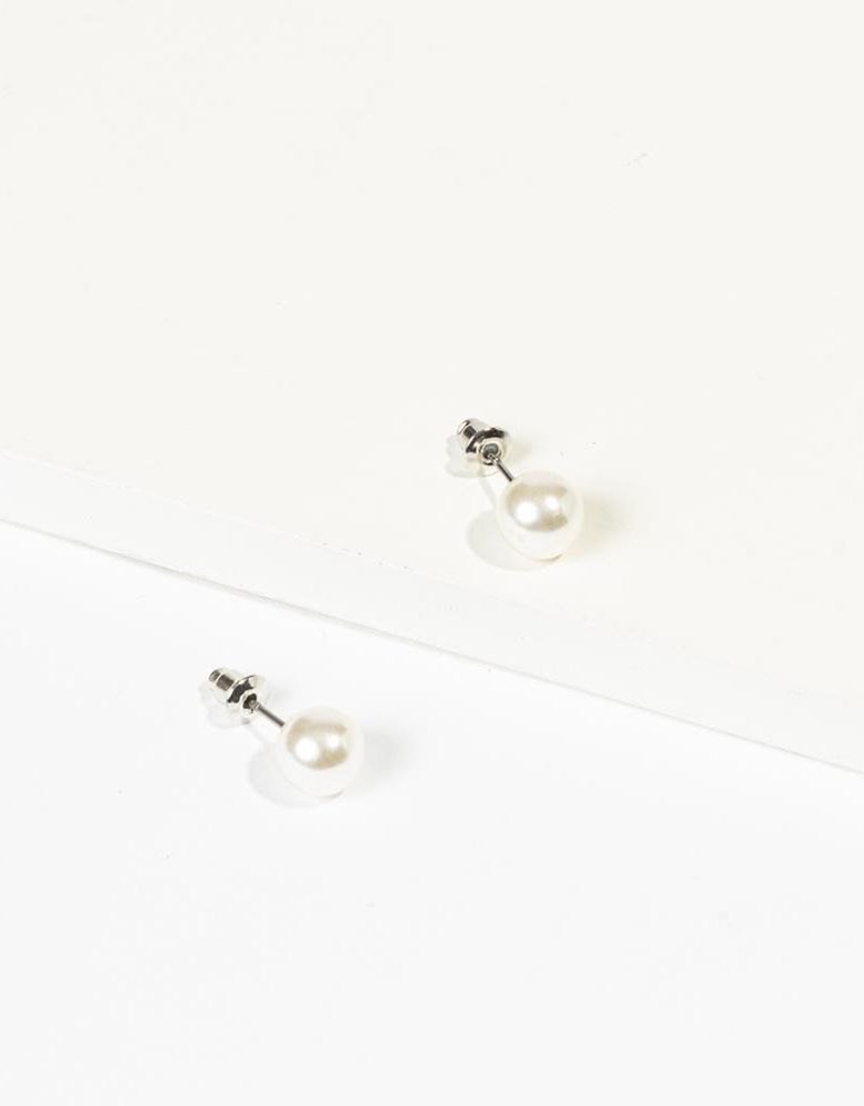 Aretes pasantes con perlas