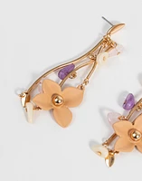 Aretes colgantes con flores