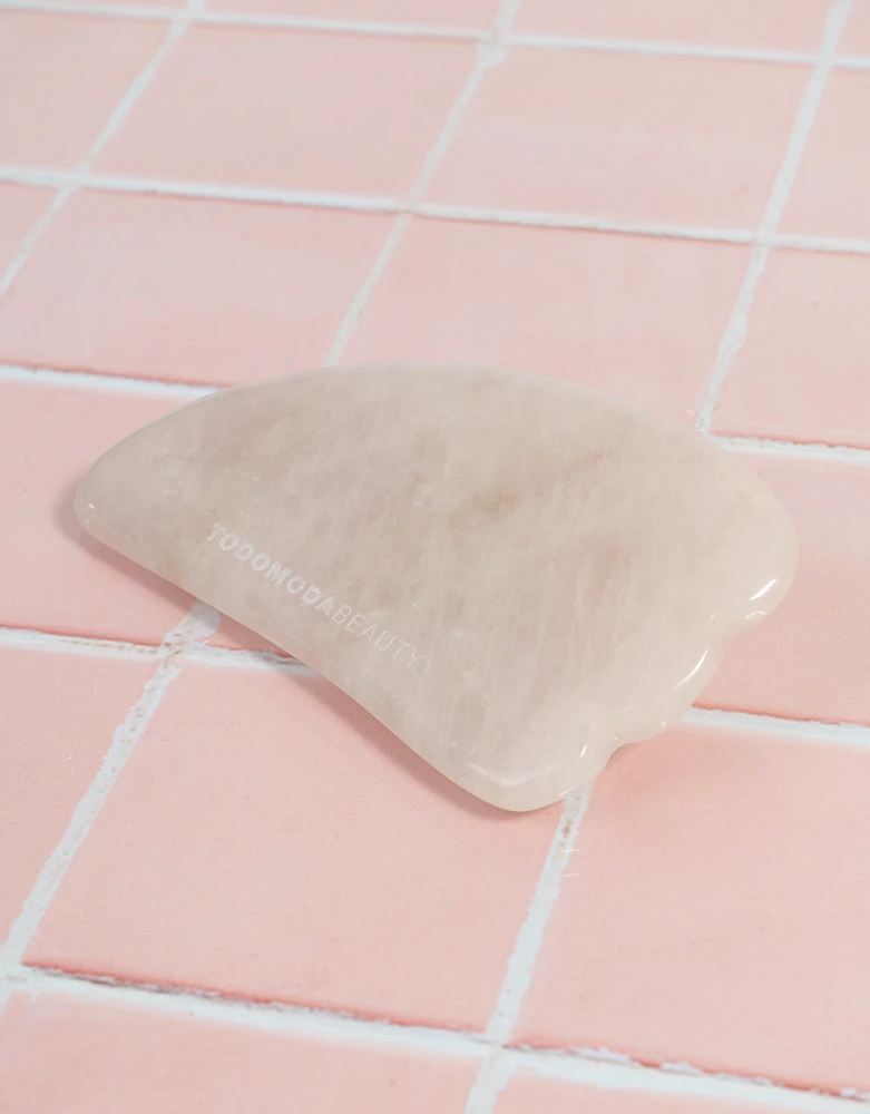 Masajeador gua sha de cuarzo