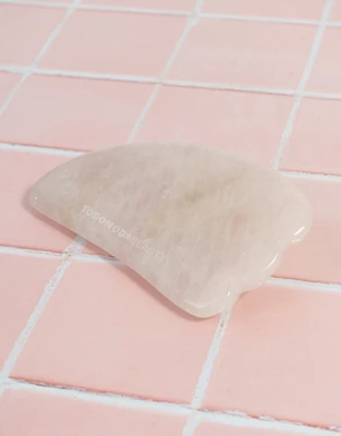 Masajeador gua sha de cuarzo