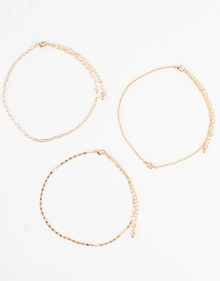 Set de chokers bañados en oro