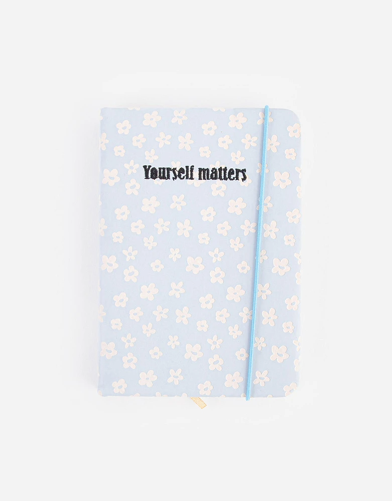 Cuaderno a6 daisy light blue