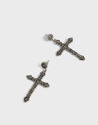 Aretes colgantes largos con cruz