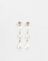 Aretes largos con perlas