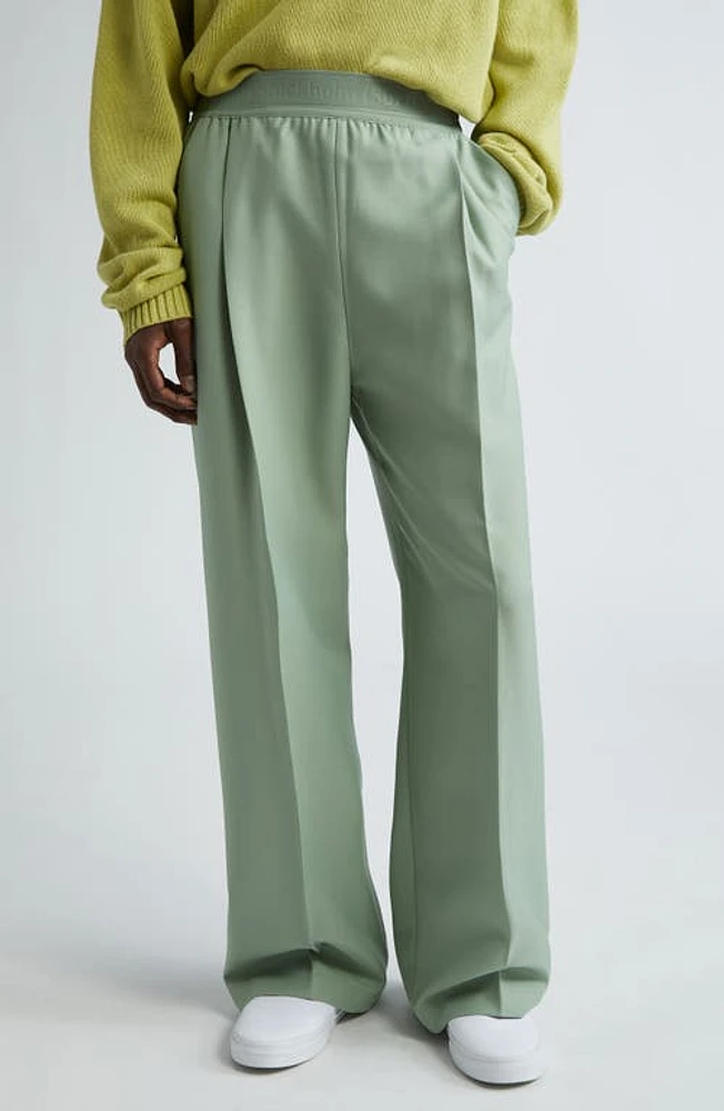 STOCKHOLM SURFBOARD CLUB Elaine Logo Jacquard Waist Pleated Wide Leg Pants Green at Nordstrom,