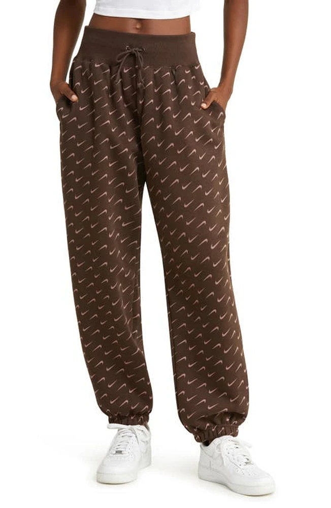 Nike Swoosh Print Cotton Blend Fleece Sweatpants in Baroque Brown at Nordstrom, Size X-Small