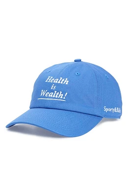 Sporty & Rich Health is Wealth Embroidered Adjustable Baseball Cap in Imperial Blue at Nordstrom