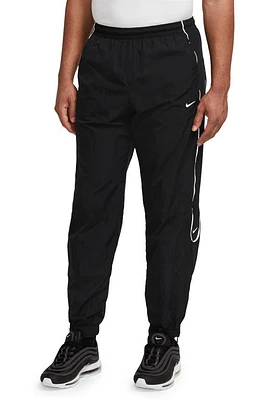 Nike Solo Swoosh Water Repellent Track Pants in Black/White at Nordstrom, Size Large