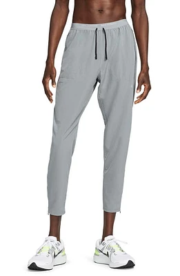 Nike Dri-FIT Phenom Woven Running Pants Silver at Nordstrom,