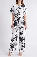 NIKKI LUND Lindsey Floral Tie Waist Jumpsuit White/black at Nordstrom,