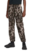 Nike ACG Wolf Tree Camo Print Polartec Fleece Pants Light Orewood Brown/Black at Nordstrom,