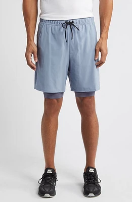 Nike Dri-FIT Unlimited 2-in-1 Versatile Shorts at Nordstrom,