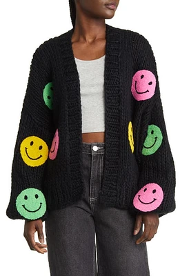 Dressed in Lala Visionary Oversize Open Front Cardigan in Black Multi Smiley at Nordstrom, Size Large