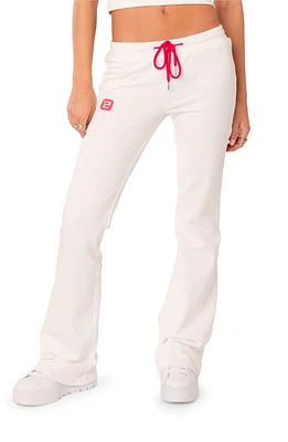 EDIKTED Cruz Low Rise Flare Sweatpants White at Nordstrom,