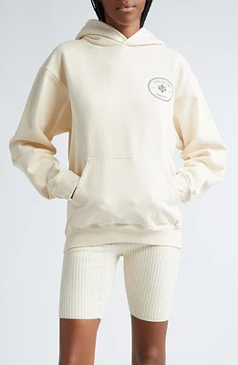 Sporty & Rich Eden Roc Crest Cotton Graphic Hoodie Cream at Nordstrom,