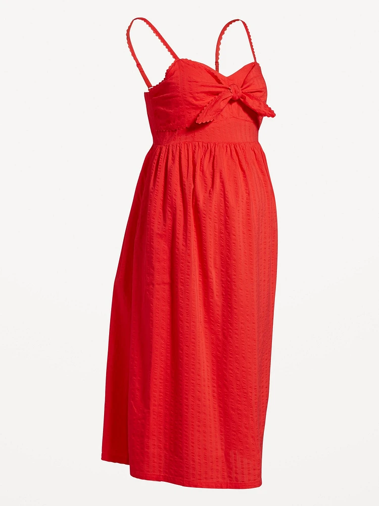 Robe de maternité ajustée et évasée nouée à l’avant