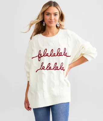 and the why Falalalala Sweater