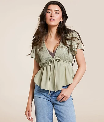 Embroidered Peplum Top