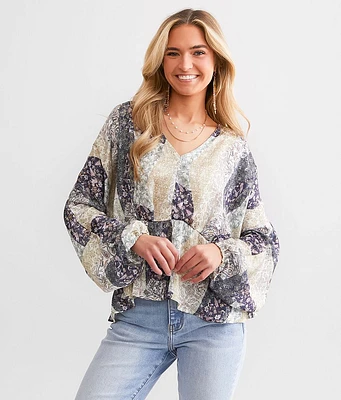 Daytrip Floral Peplum Dolman Top