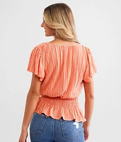 Plisse Peplum Top